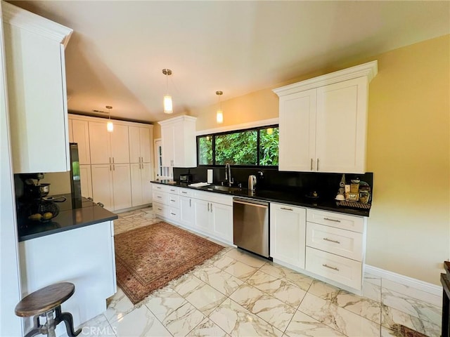 kitchen with backsplash, hanging light fixtures, white cabinets, and stainless steel dishwasher