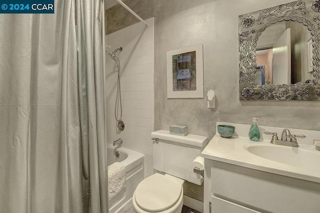 full bathroom with vanity, toilet, and shower / bath combo with shower curtain