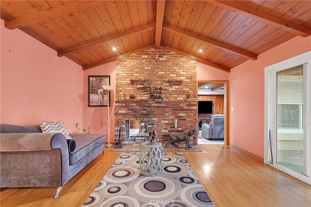 living room featuring wood ceiling, light hardwood / wood-style flooring, and lofted ceiling with beams