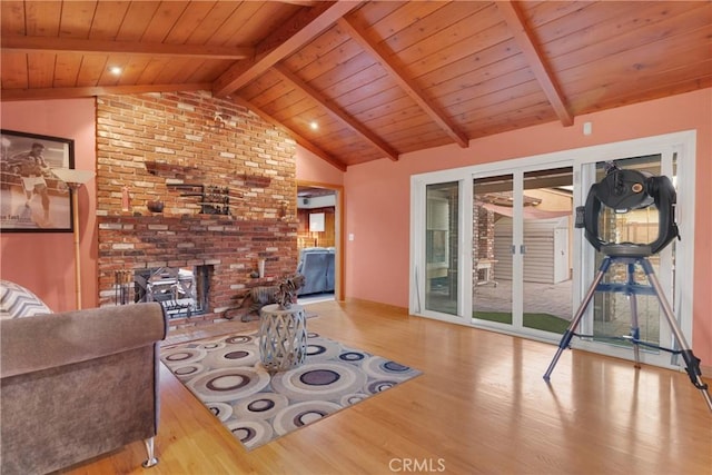 living room featuring wooden ceiling, lofted ceiling with beams, and light wood-type flooring