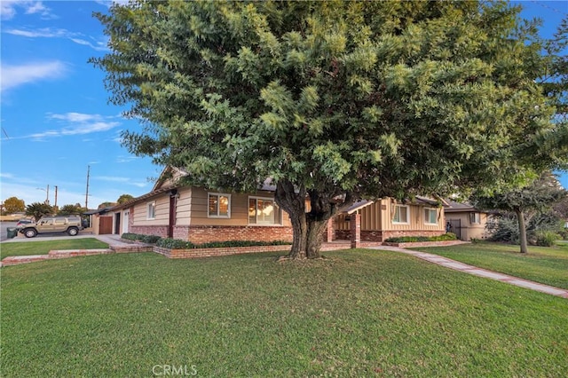 view of front of house with a front lawn