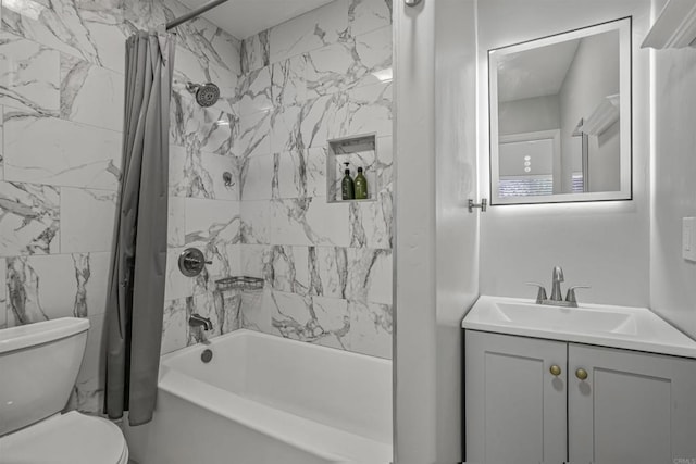 full bathroom featuring shower / tub combo, vanity, and toilet