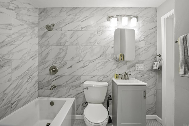 full bathroom featuring vanity, tiled shower / bath, and toilet