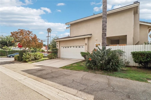 view of side of home with a garage