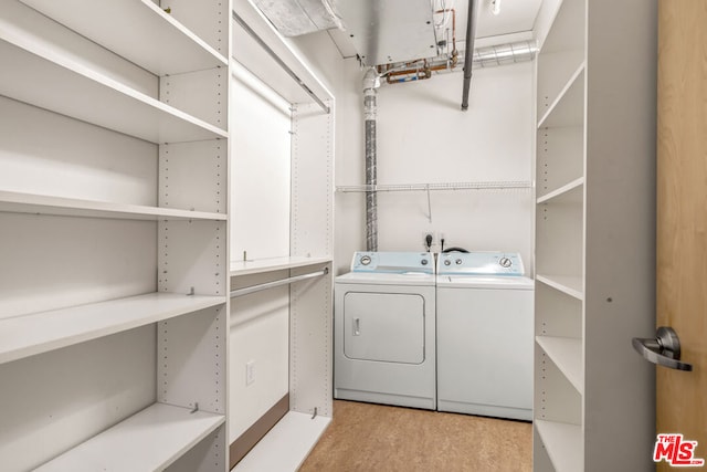 laundry area featuring independent washer and dryer