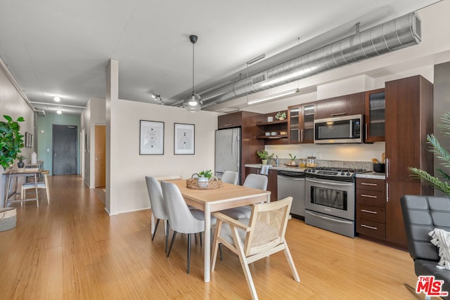 dining room with light hardwood / wood-style floors