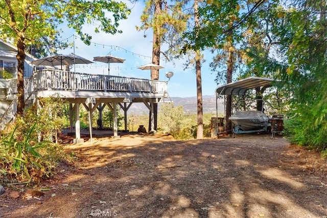 view of yard with a deck