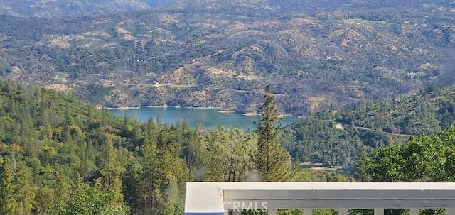 view of mountain feature featuring a water view