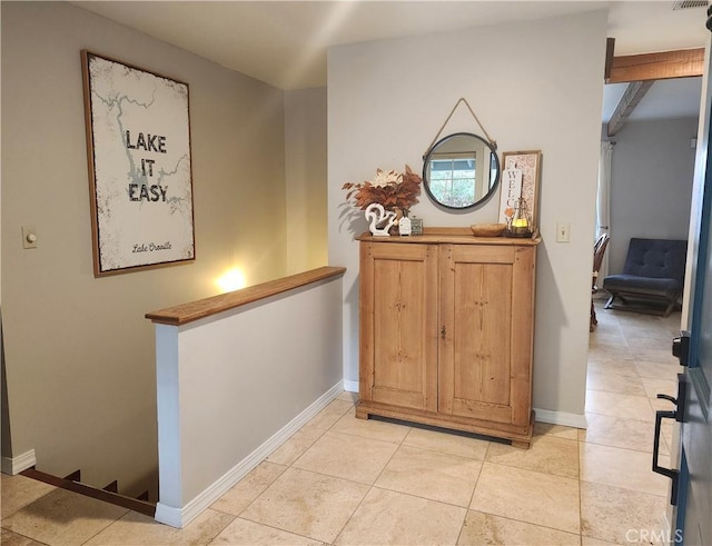 interior space featuring light tile patterned floors