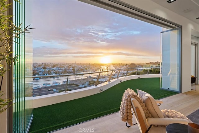 view of balcony at dusk