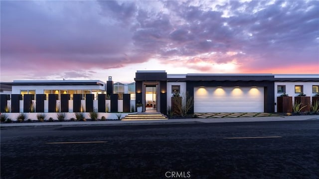 contemporary home featuring a garage