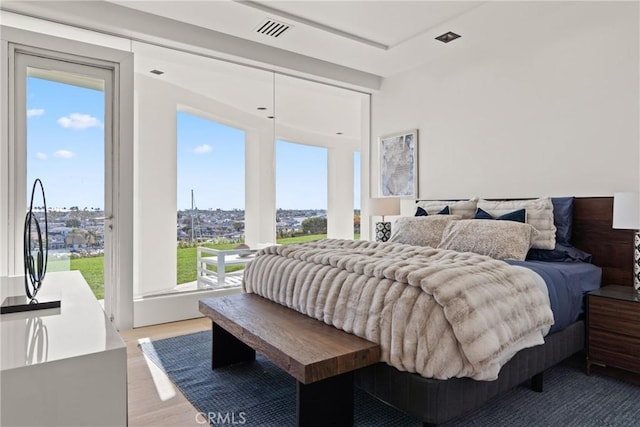 bedroom featuring light hardwood / wood-style floors