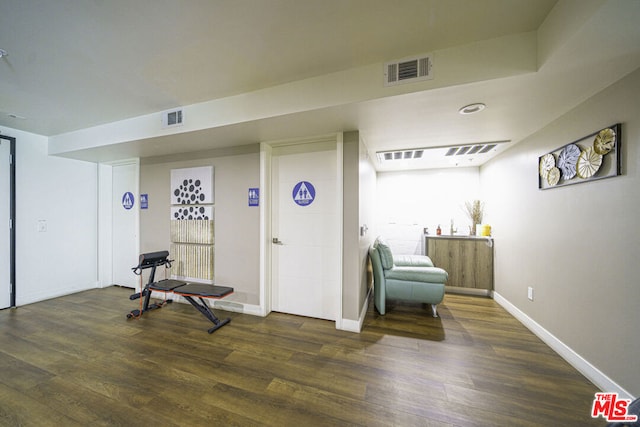 living area featuring dark wood-type flooring