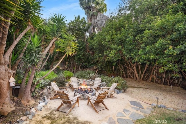 view of patio / terrace with a fire pit