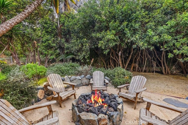 view of patio featuring an outdoor fire pit