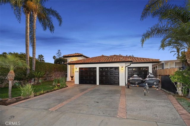 2308 S Ola Vis, San Clemente, CA 92672 - view of front of property featuring fence, a garage, stucco siding, concrete driveway, and a tiled roof