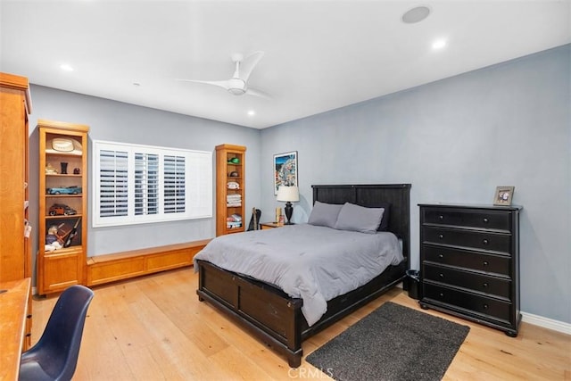 bedroom featuring ceiling fan and light wood-type flooring