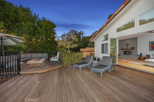 wooden deck with outdoor lounge area