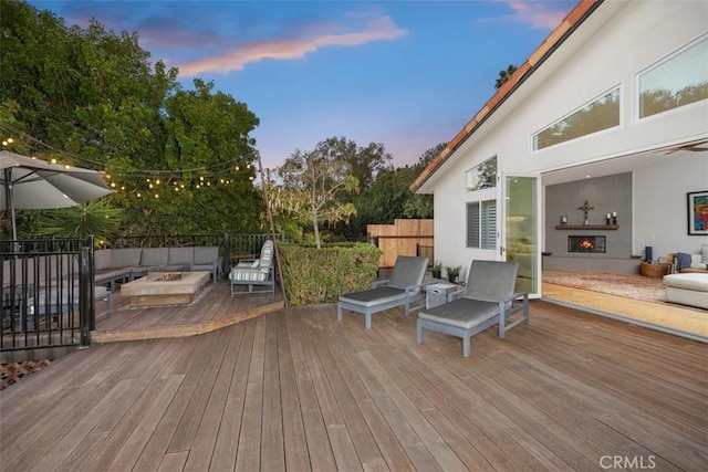 2308 S Ola Vis, San Clemente, CA 92672 - deck at dusk featuring an outdoor living space with a fire pit and fence