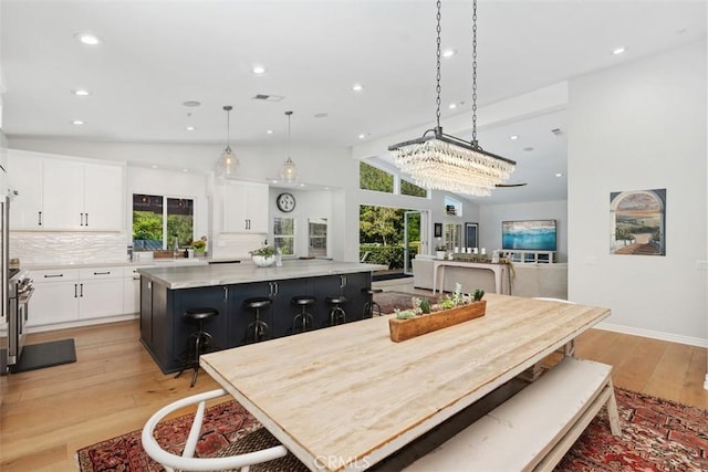 2308 S Ola Vis, San Clemente, CA 92672 - dining area featuring recessed lighting, light wood-style flooring, visible vents, and an inviting chandelier