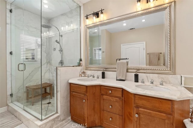 2308 S Ola Vis, San Clemente, CA 92672 - full bathroom with double vanity, recessed lighting, a marble finish shower, and a sink