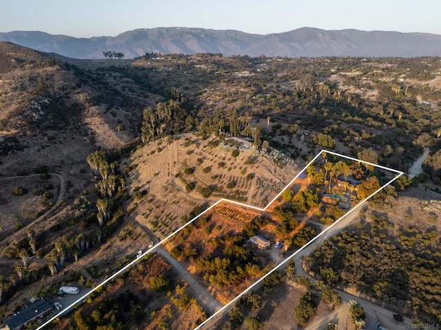 bird's eye view with a mountain view