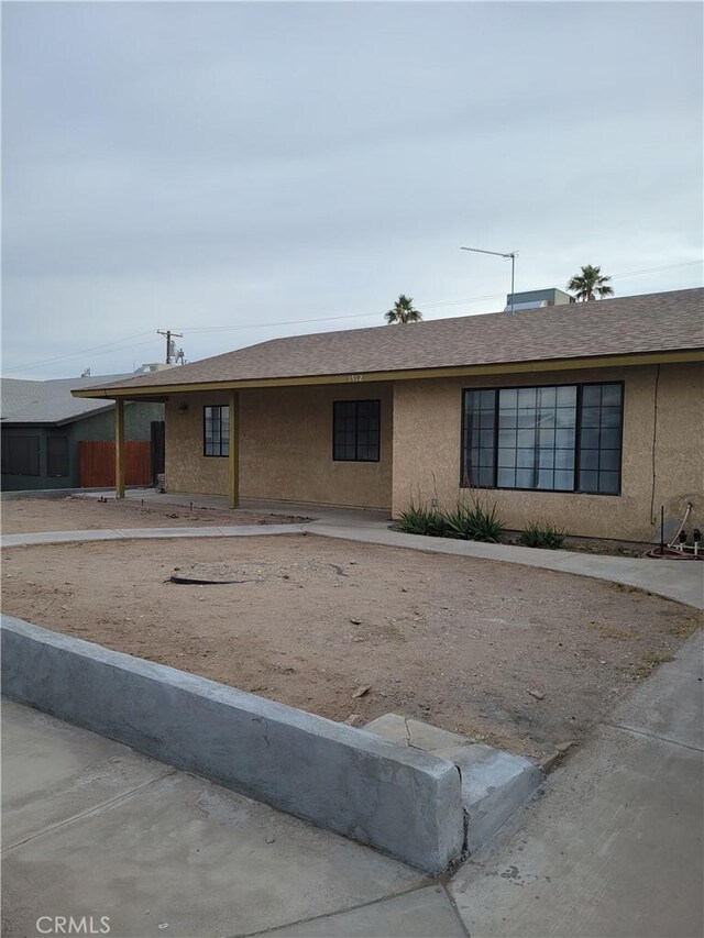1912 Cortez St, Needles, CA 92363 - ranch-style home featuring stucco siding and a shingled roof