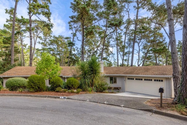 single story home with a garage