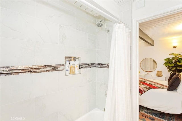 bathroom featuring shower / bath combination with curtain