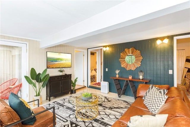 living room with wood walls