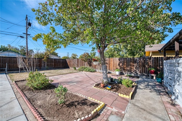 981 N Thorne Ave, Fresno, CA 93728 - fenced backyard featuring a patio area