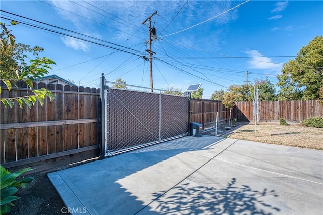 981 N Thorne Ave, Fresno, CA 93728 - gate with a fenced backyard and a patio