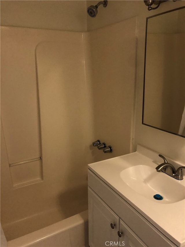 bathroom featuring vanity and shower / washtub combination