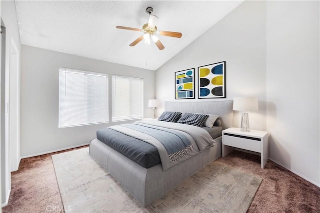 bedroom with ceiling fan, carpet, and lofted ceiling