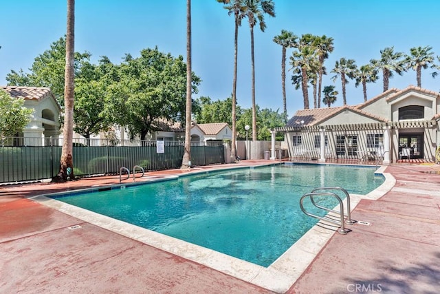 view of pool featuring a patio area