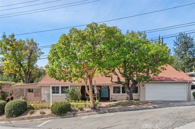 view of front of home with a garage