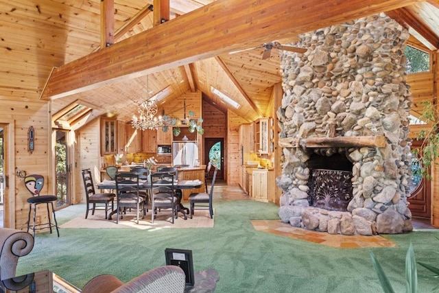 unfurnished dining area with light carpet, wooden ceiling, a chandelier, and wood walls