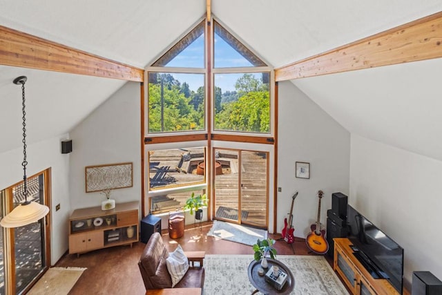 living room with beam ceiling, dark wood-type flooring, and high vaulted ceiling