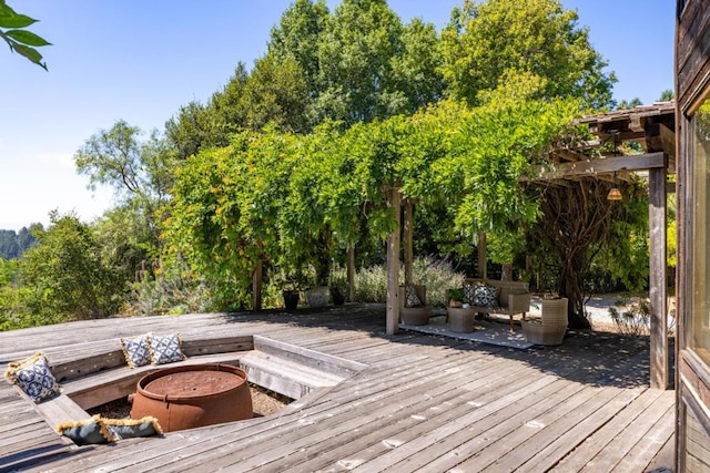 deck featuring a fire pit