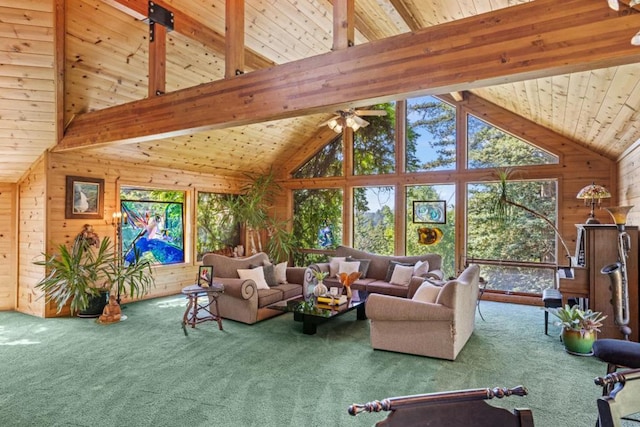 living room with carpet flooring, wooden ceiling, and wooden walls