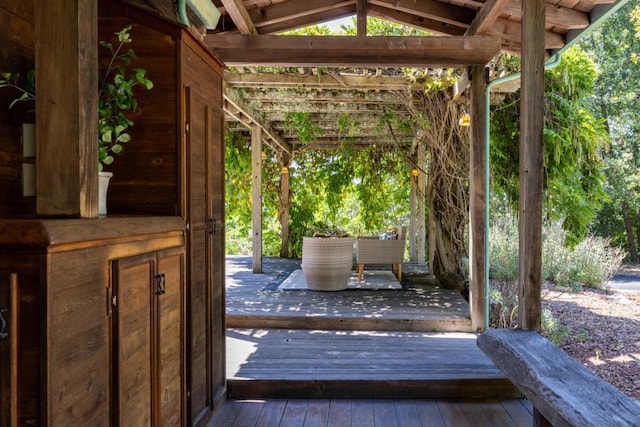 entryway featuring wood-type flooring and vaulted ceiling