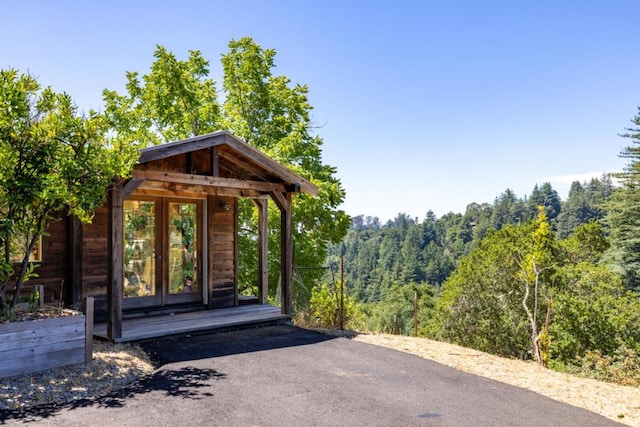 view of outbuilding featuring french doors