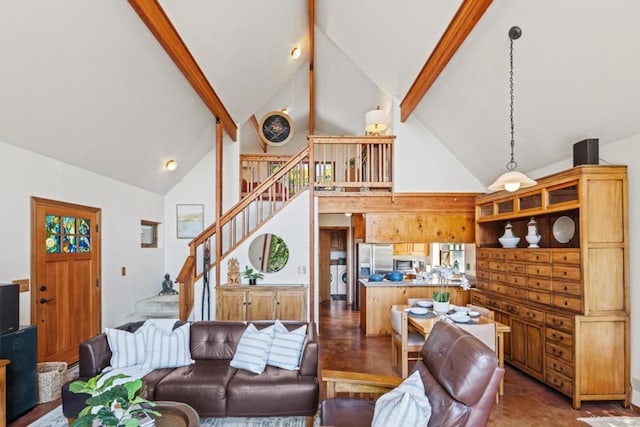 living room featuring high vaulted ceiling and beamed ceiling