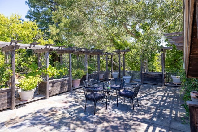 view of patio featuring a pergola