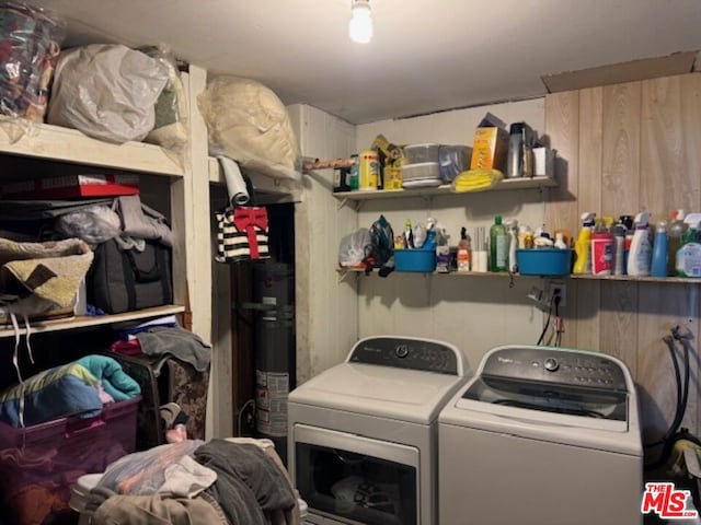 laundry room featuring washing machine and clothes dryer