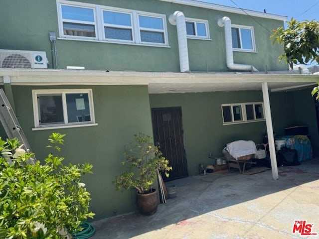 rear view of house with a patio