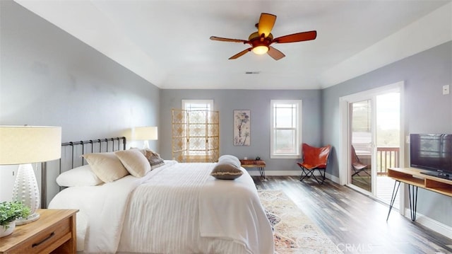 bedroom featuring ceiling fan and dark hardwood / wood-style floors