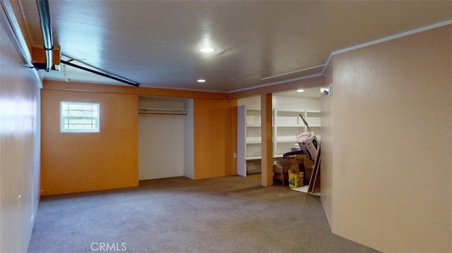 unfurnished bedroom featuring carpet and ornamental molding