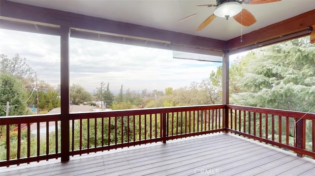 wooden deck with ceiling fan