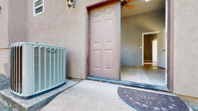 doorway to property with cooling unit